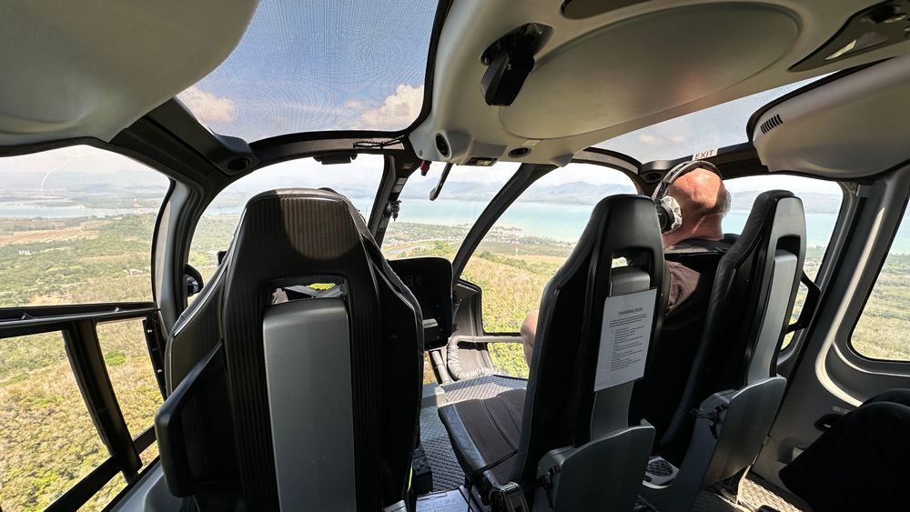 Cockpit of helicopter flying over Phuket