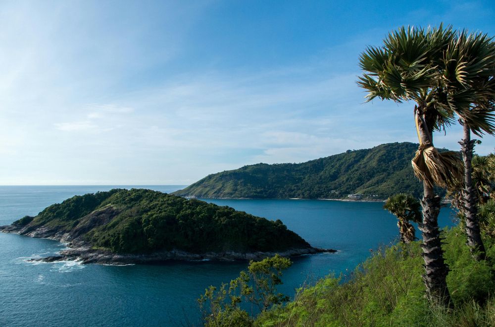 looking out off a cliff in phuket at the beautiful sea and islands. 