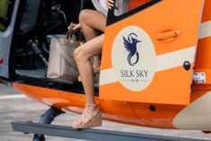 Guests boarding a Silk Sky Air helicopter in Phuket